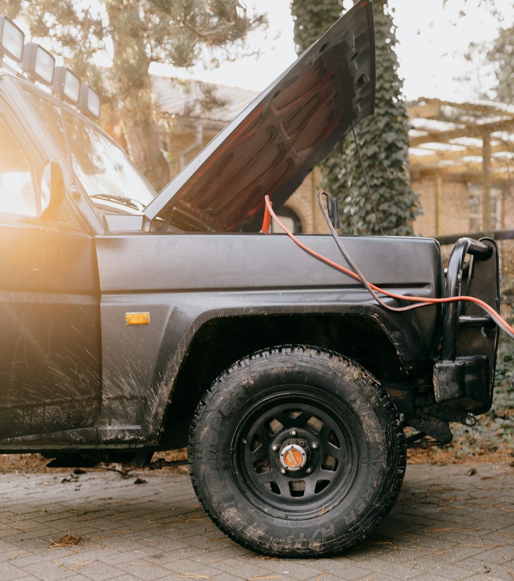 brown and black single cab pickup truck