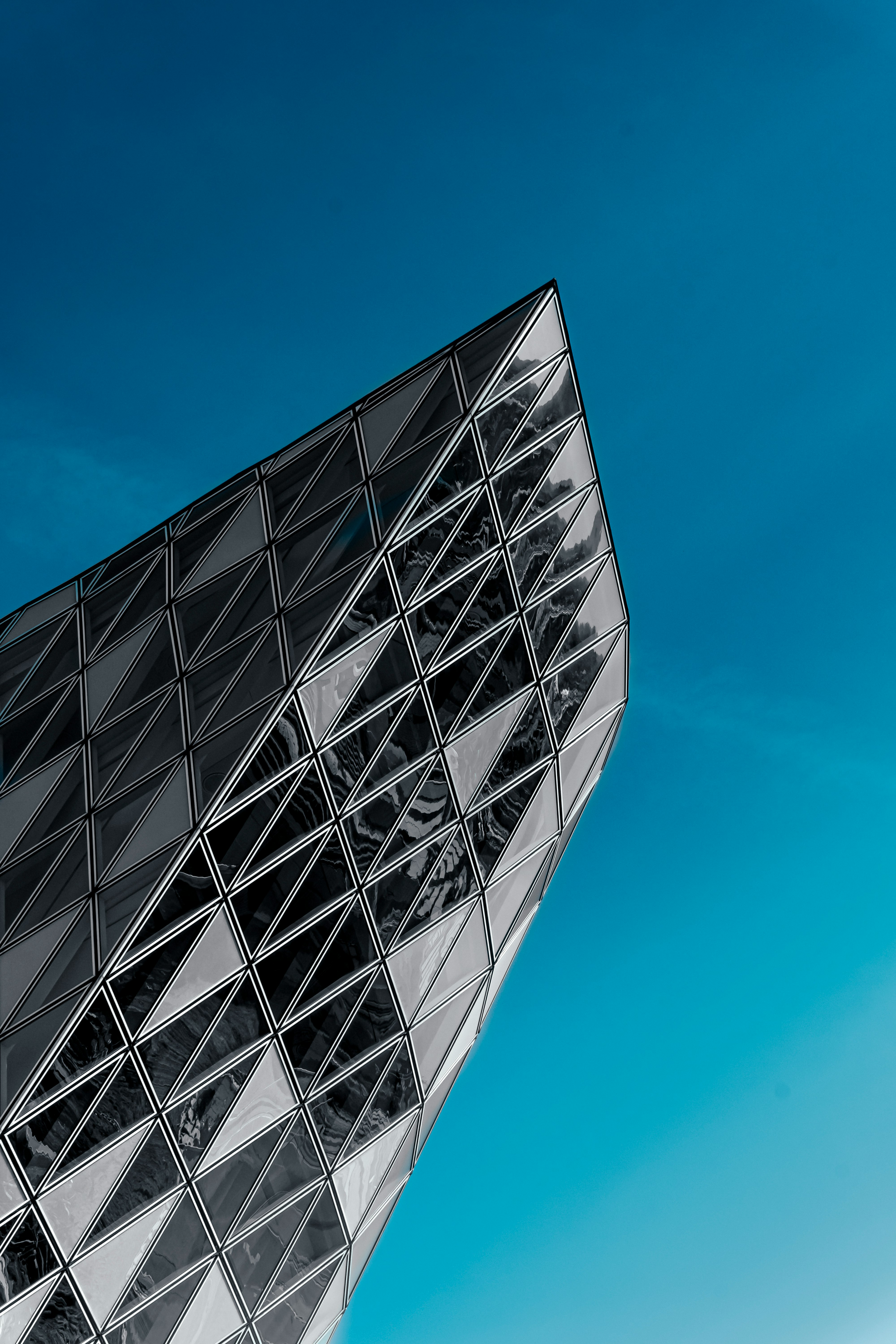 black and white building under blue sky during daytime