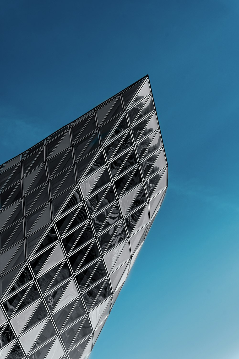 black and white building under blue sky during daytime