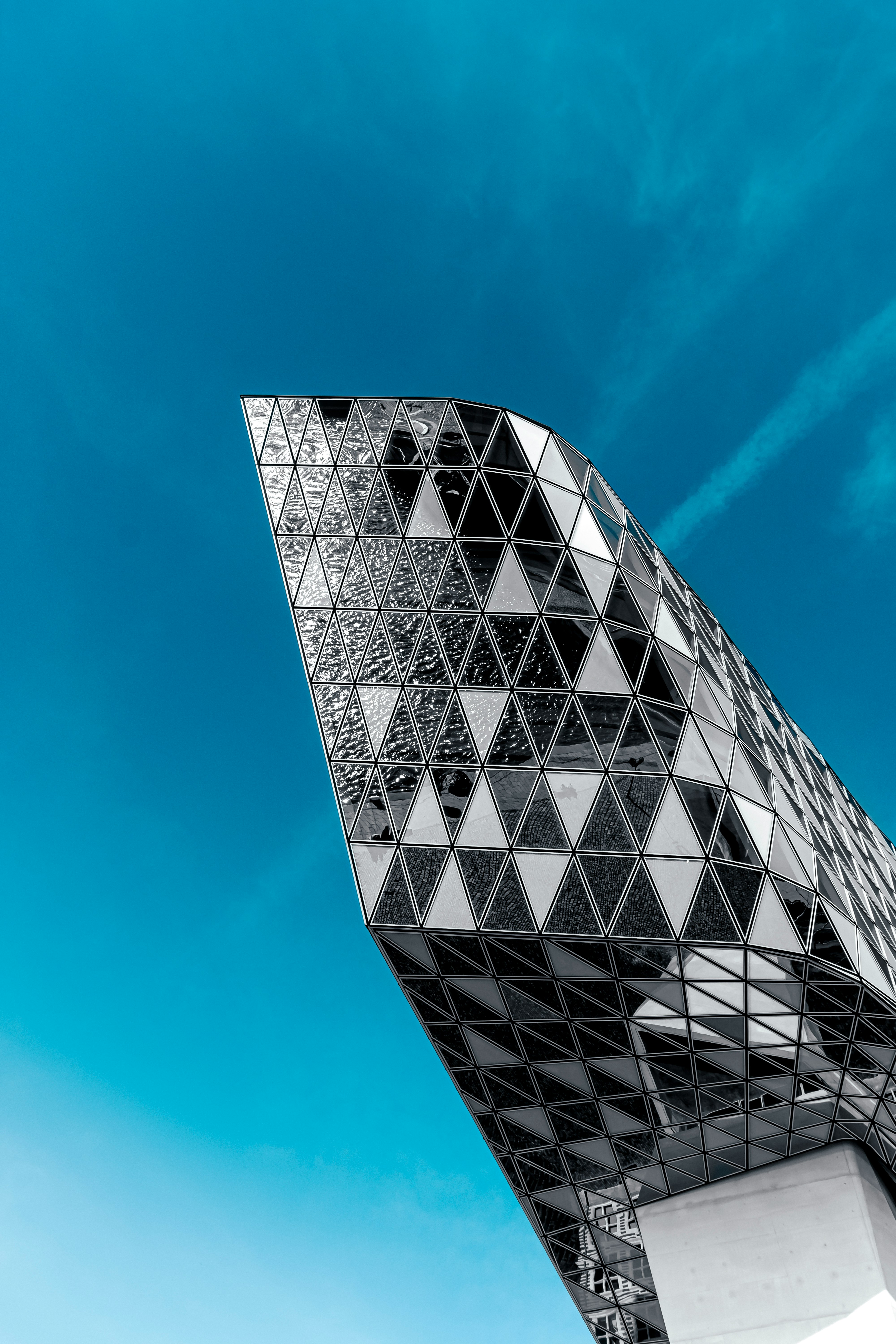 white and black building under blue sky during daytime