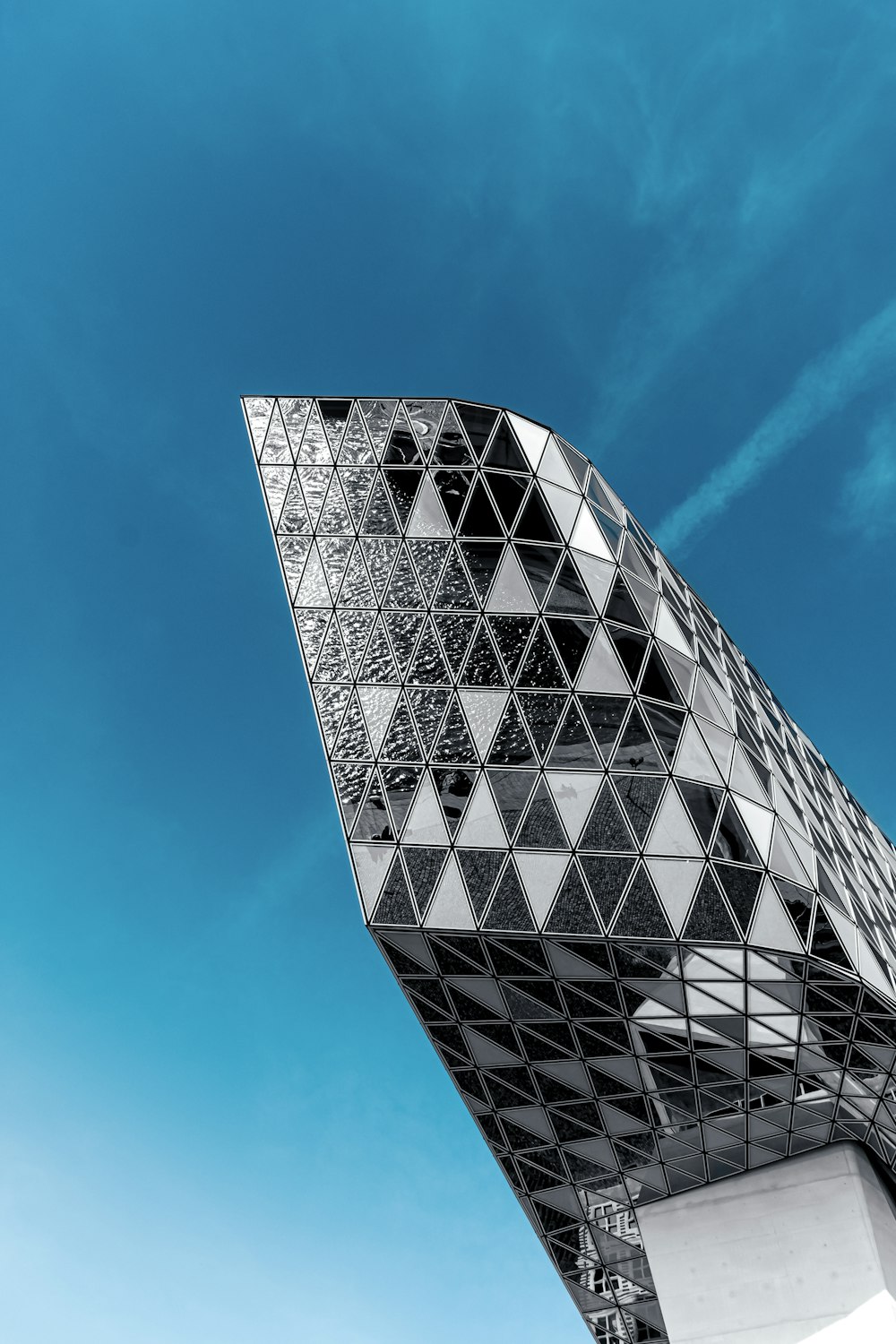 white and black building under blue sky during daytime