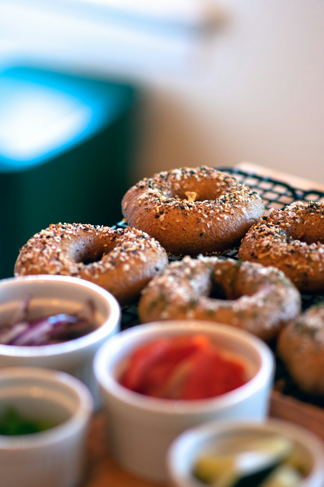 brown doughnut with red sauce on top