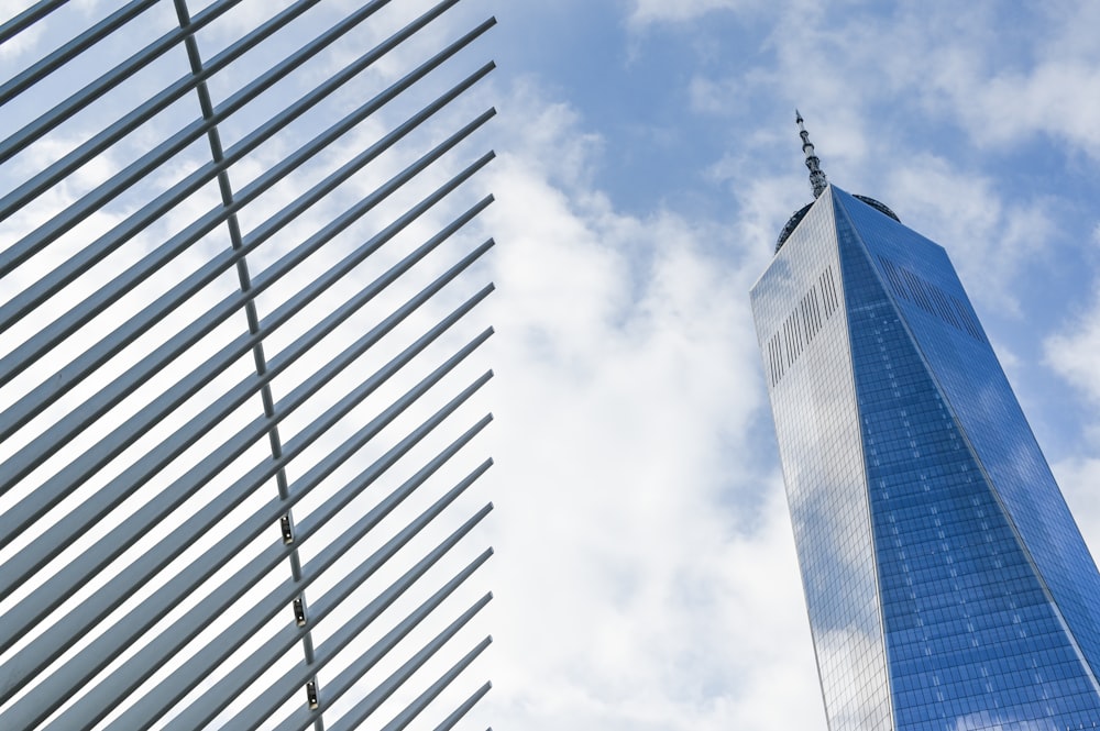 gray concrete building under white clouds during daytime