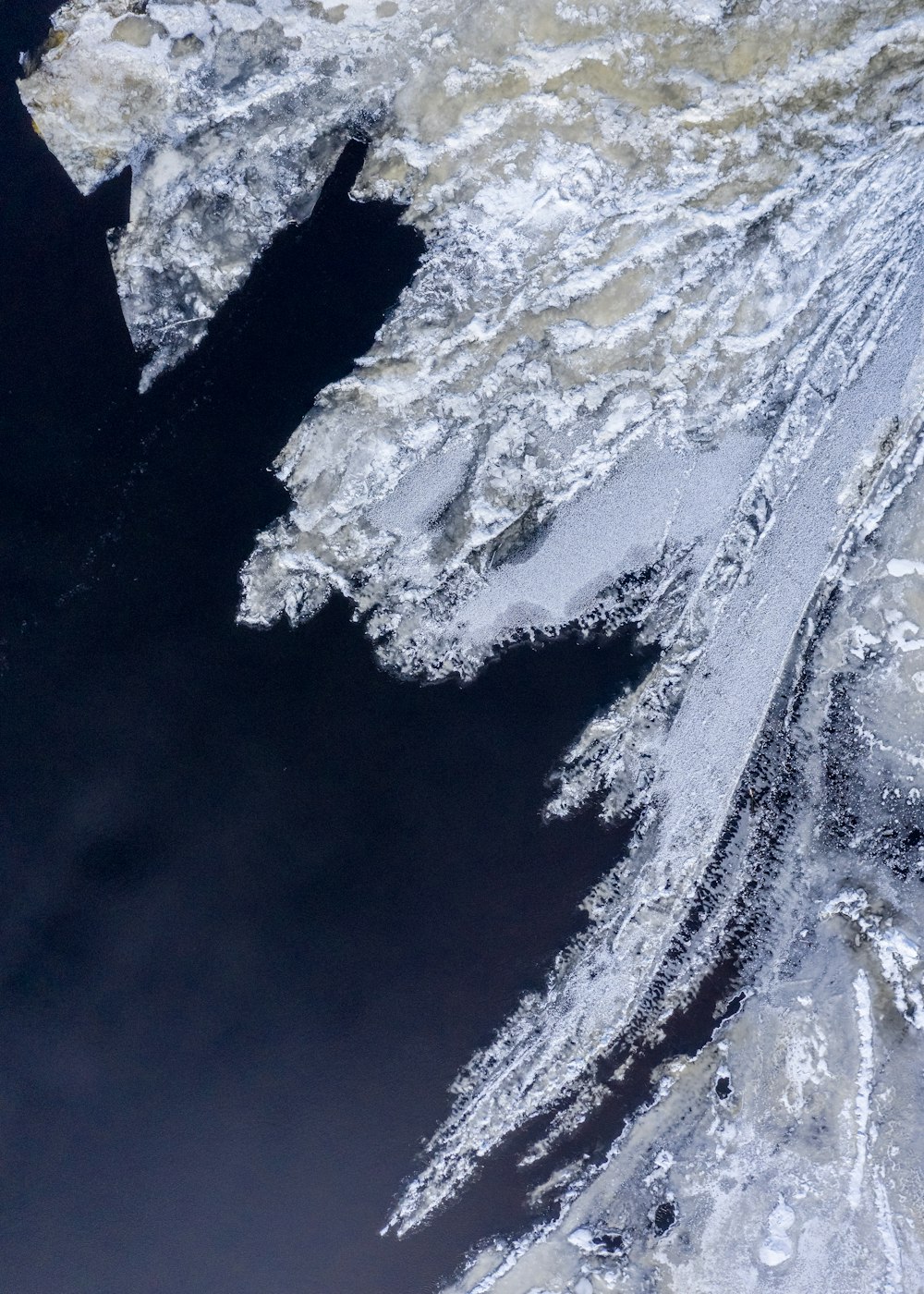 snow covered mountain during daytime