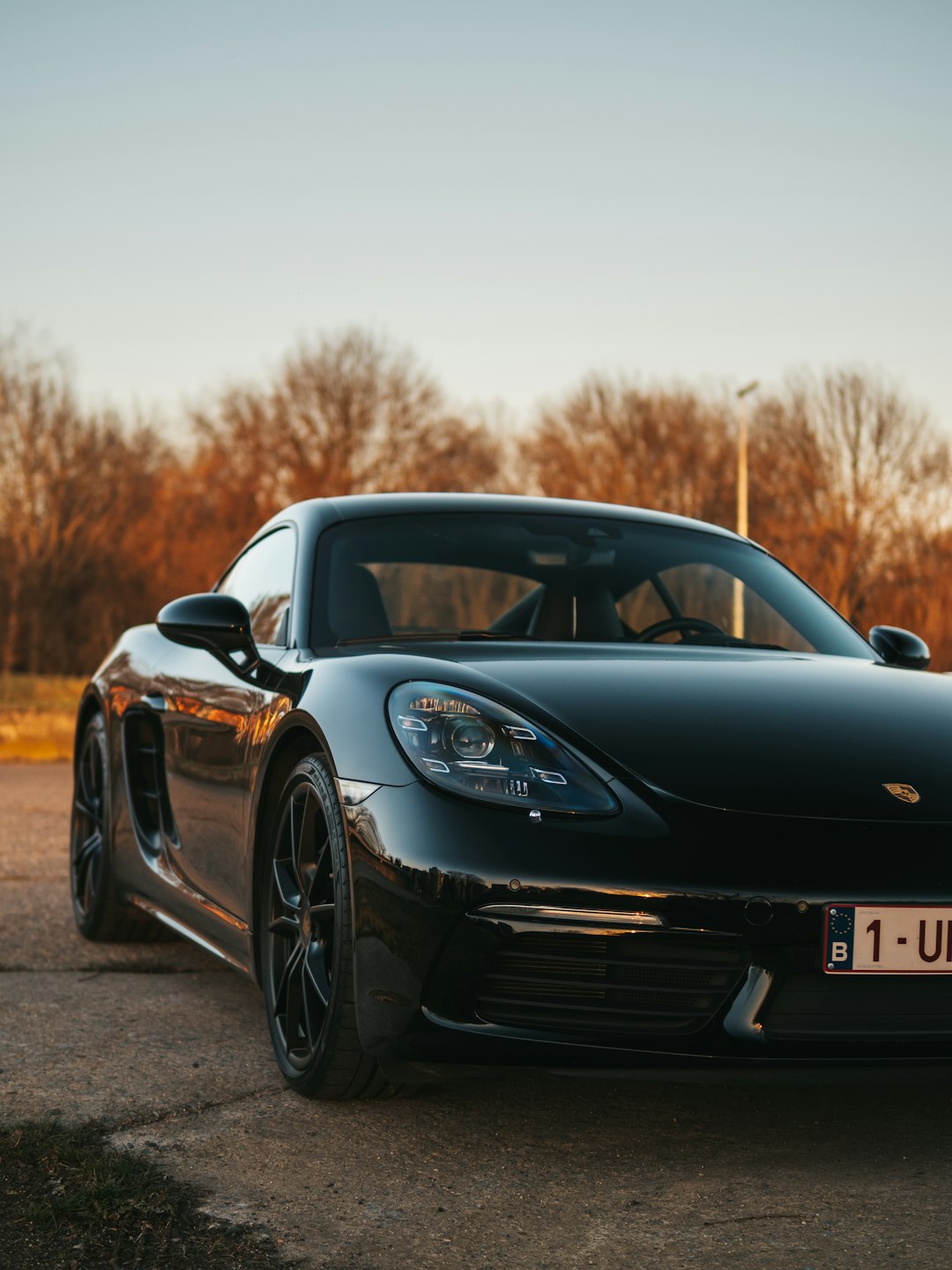 black porsche 911 on road during daytime