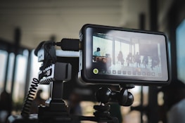 black android smartphone on black and white camera