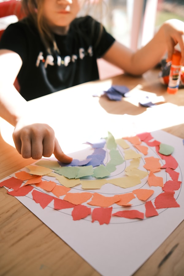 Child working on a creative paper craft activity