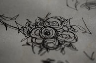 Close-up of a detailed sketch that inspired a popular merchandise design.