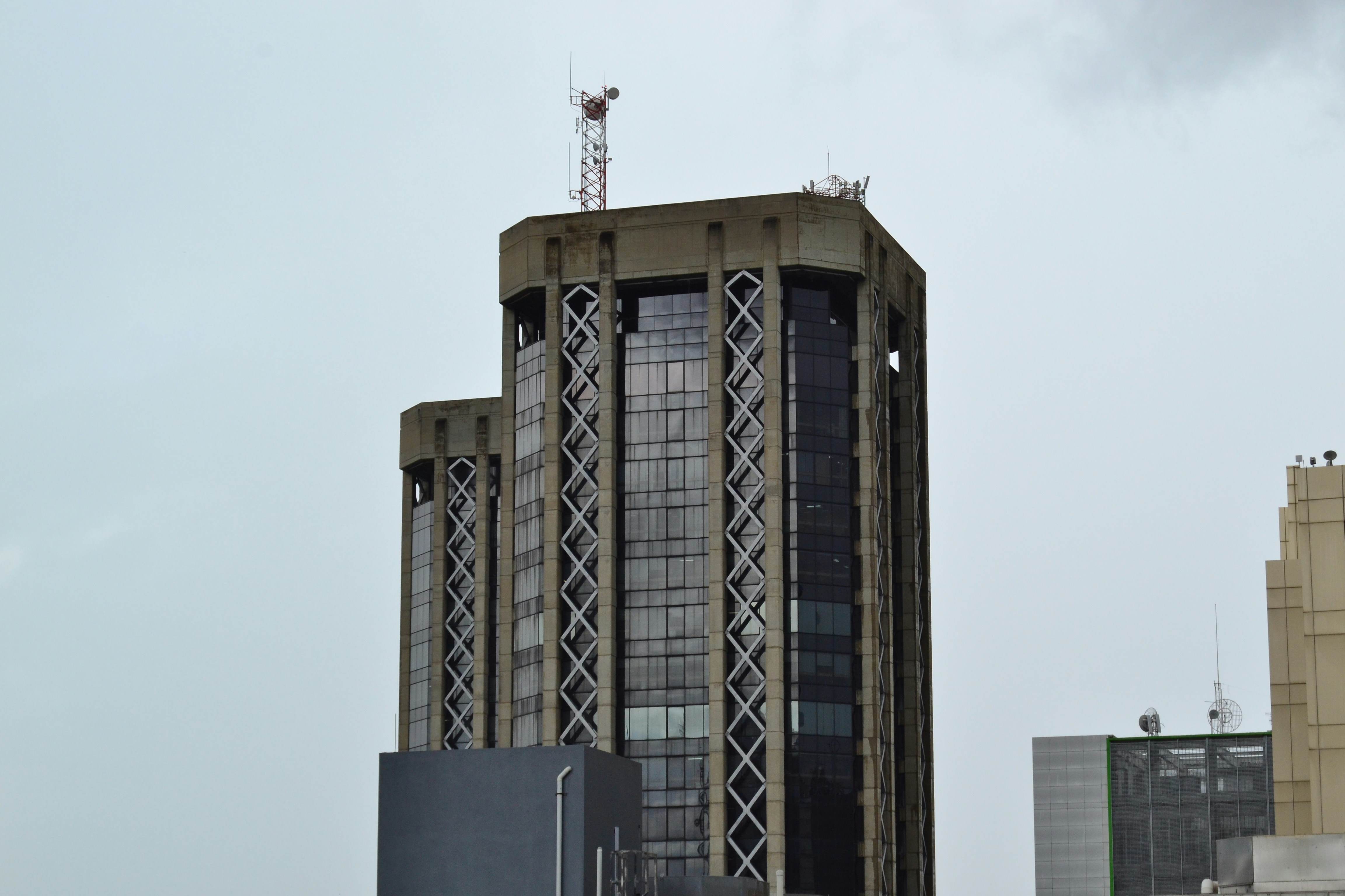 Gray concrete building under gray sky