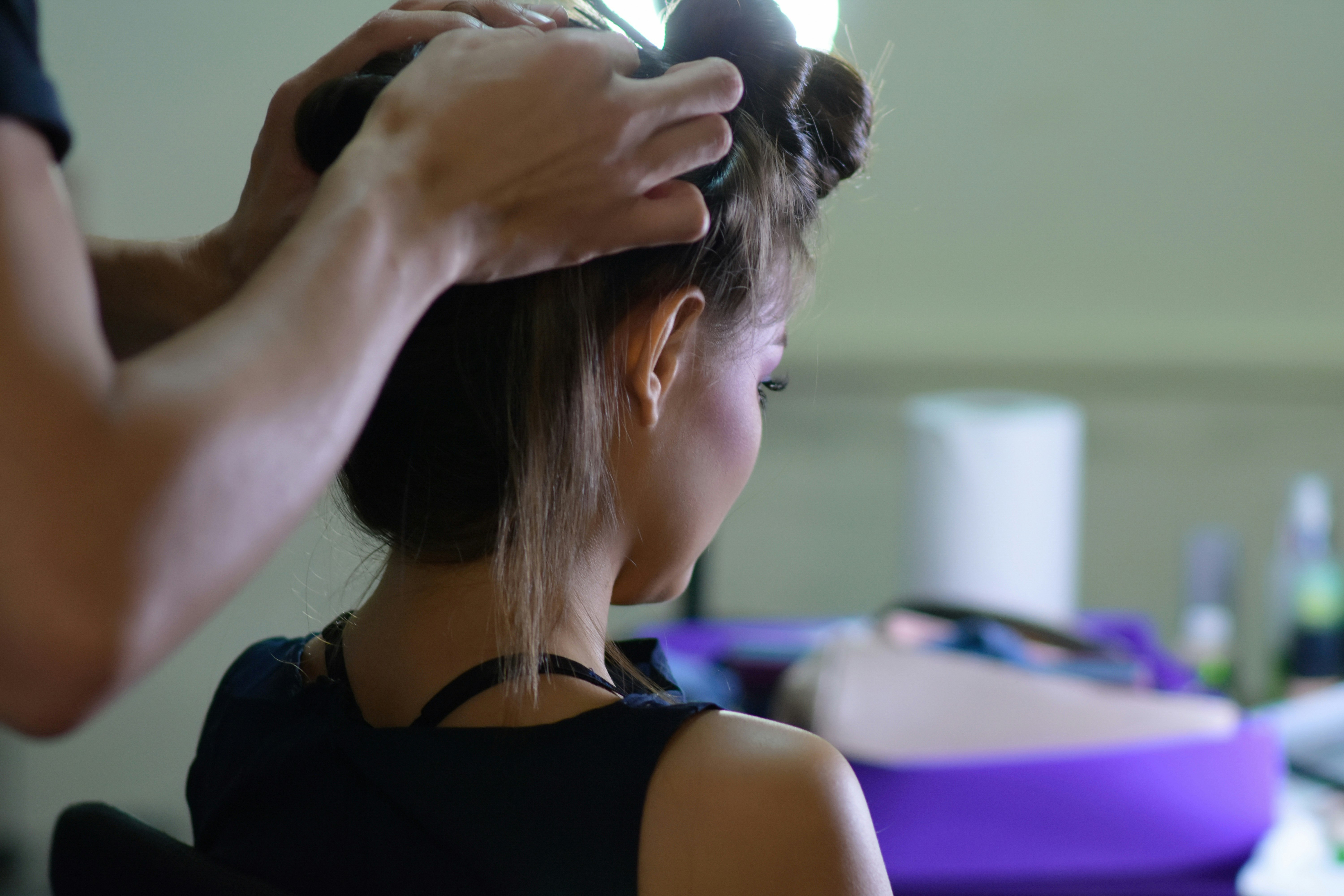 Stylist doing balayage highlights at Elevation Salon