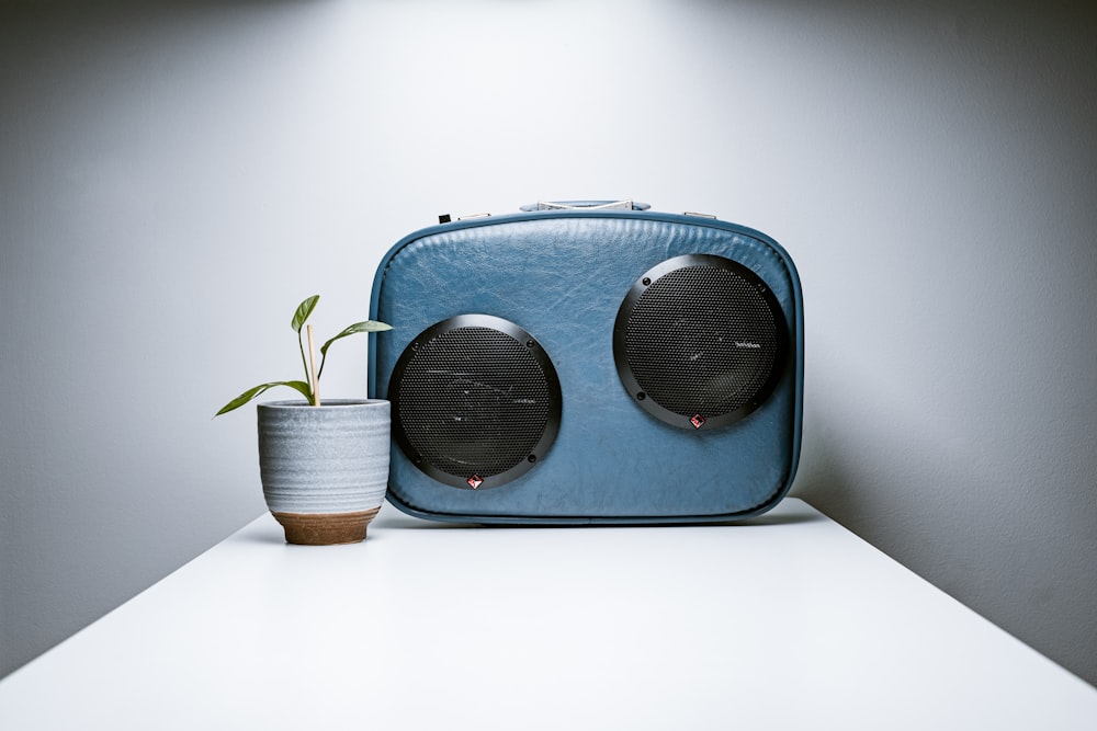 blue and brown radio on white table