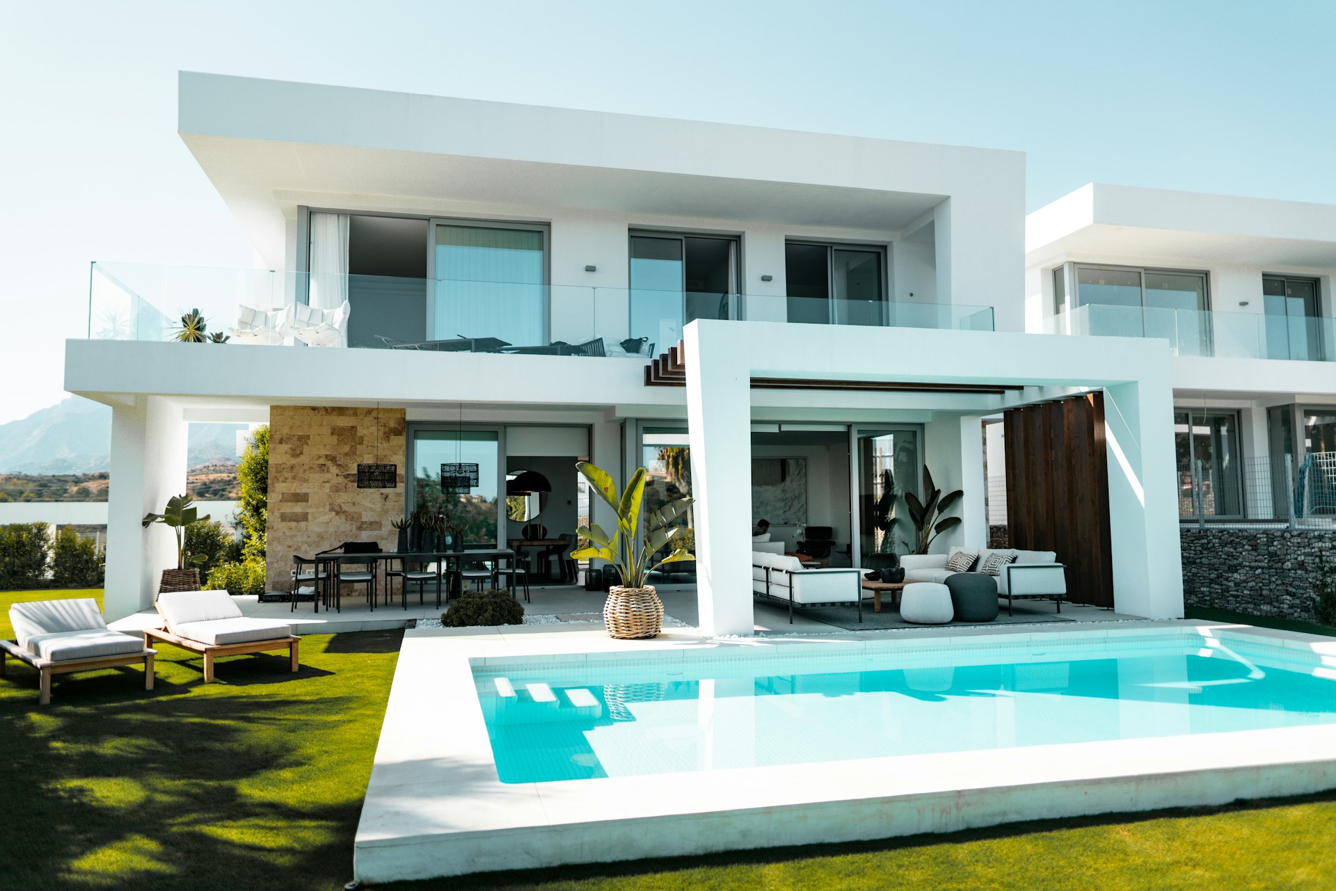 Contemporary white Miami estate with a private pool terrace