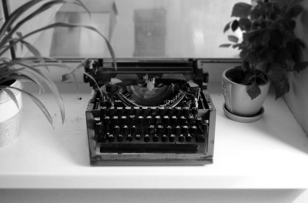 black typewriter on white table