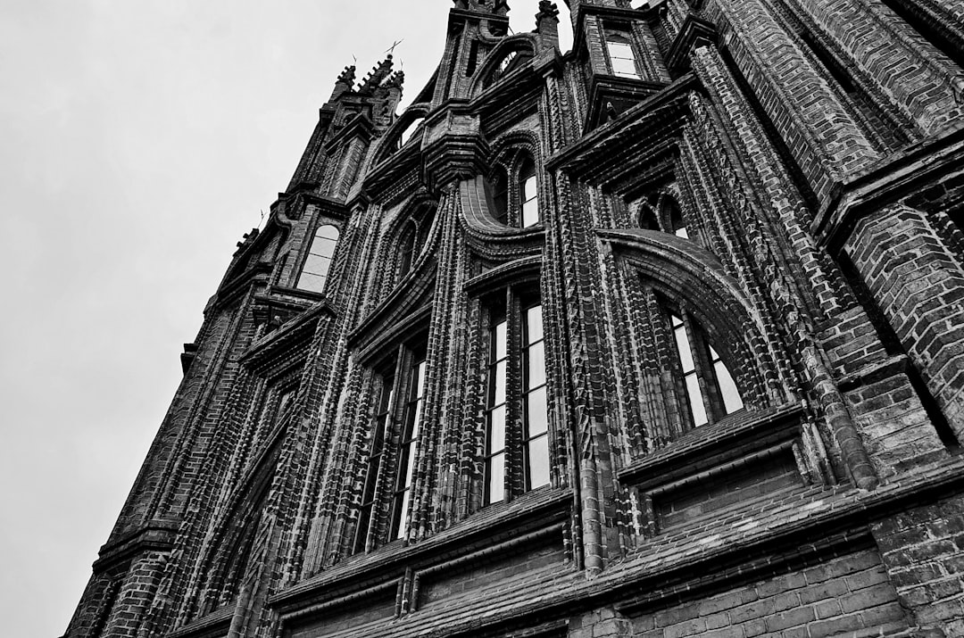 grayscale photo of concrete building,