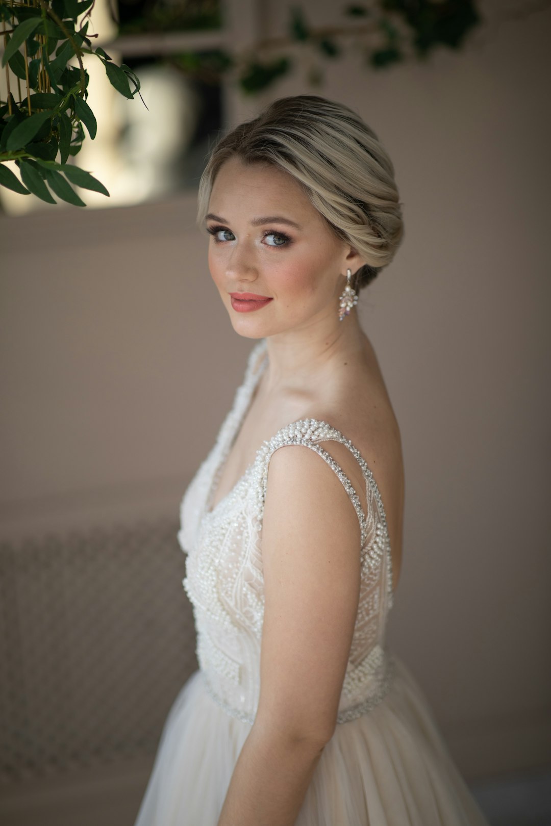 woman in white sleeveless dress