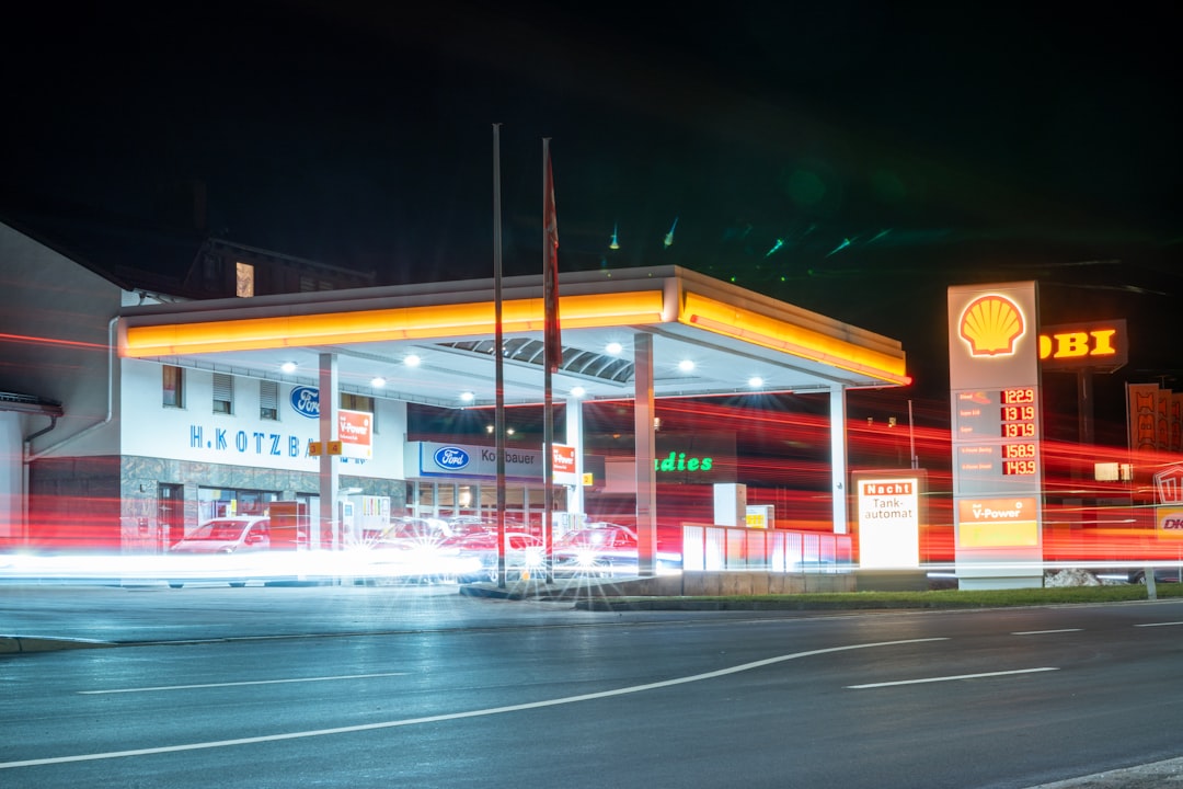 white and red store front during night time