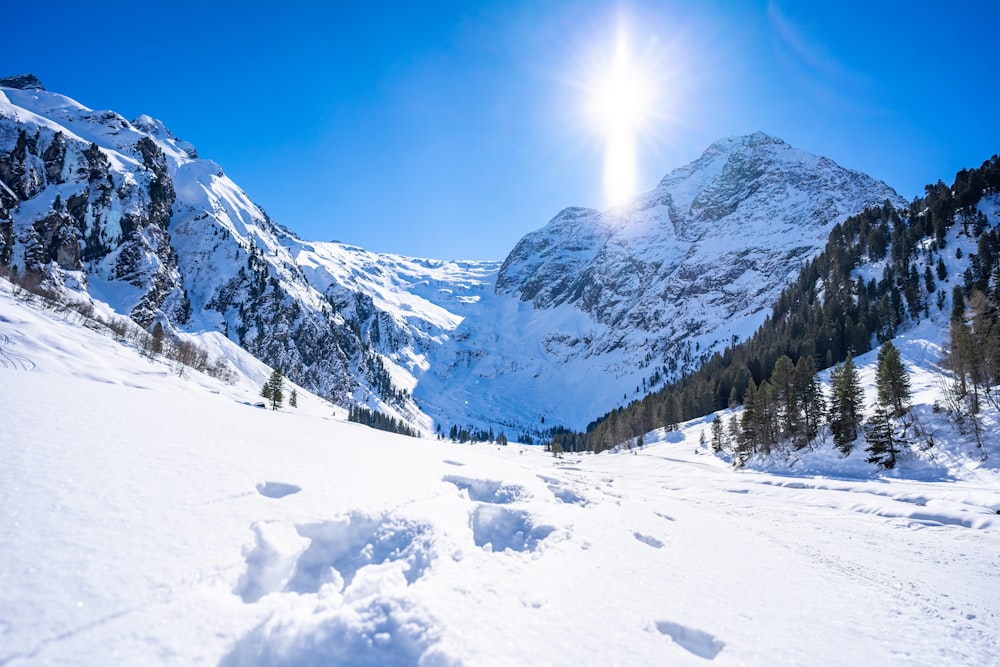 snow covered mountain under blue sky during daytime