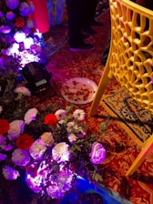 A vibrant kına night setup with traditional decorations and lighting.