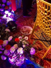 A vibrant engagement party setup with elegant gold decorations and joyful guests.