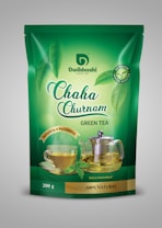 A green tea package with branding that includes images of a glass cup of tea and a glass teapot with tea in them. The packaging is predominantly green with the brand name 'Dwibhashi' and product name 'Chaha Churnam' prominently displayed. The package highlights the tea's natural, antioxidant-rich qualities, and features imagery of fresh green tea leaves.