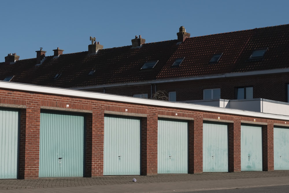 white and red building under blue sky during daytime