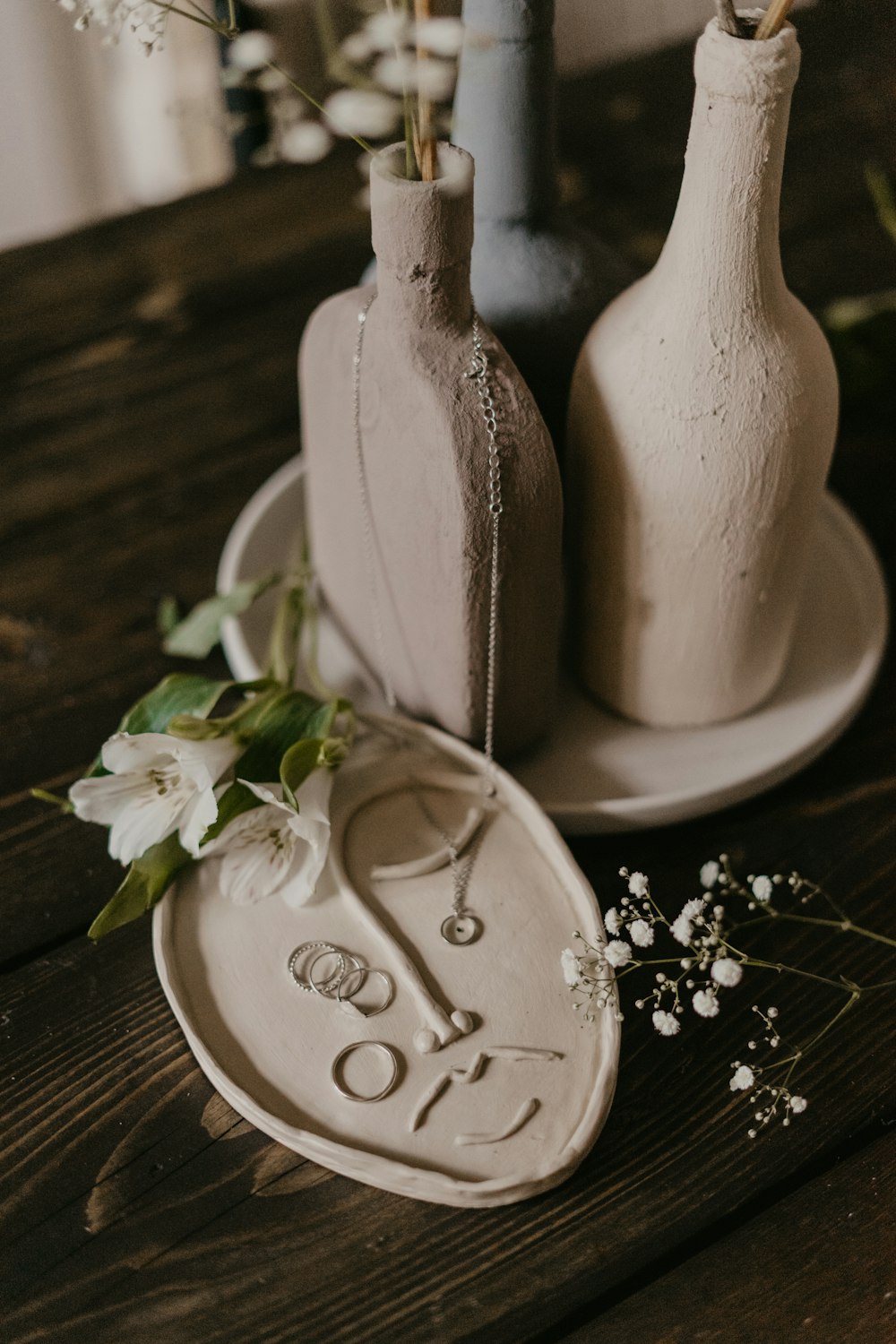 white ceramic figurine on brown wooden table