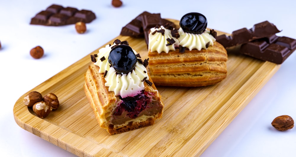 brown and white cake on brown wooden board