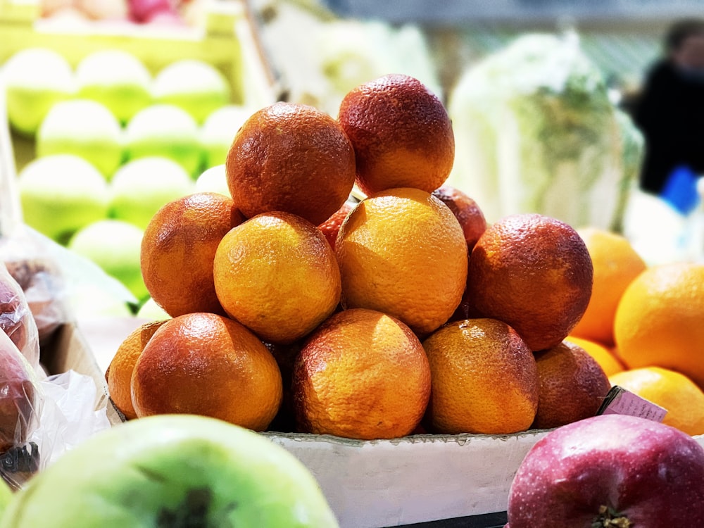 orange fruits on white tray