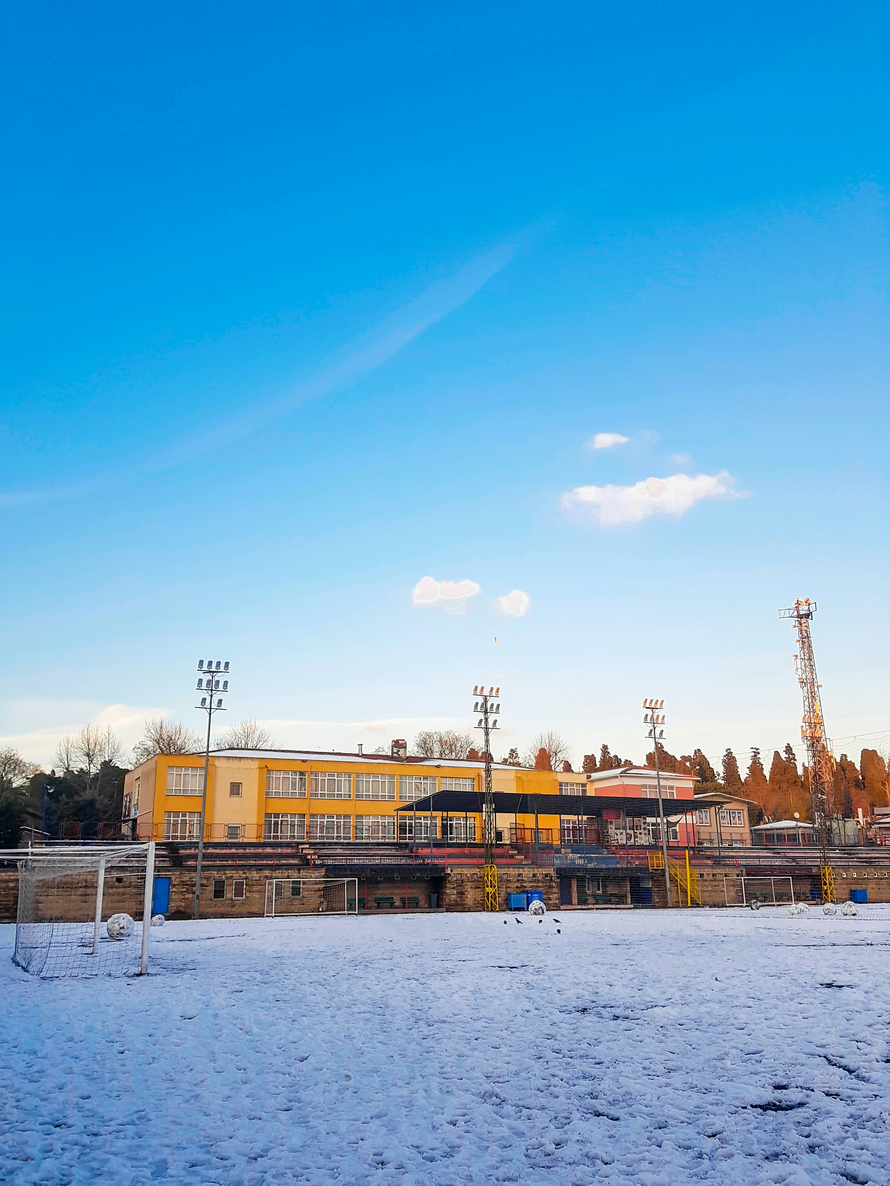 brown concrete building under blue sky during daytime