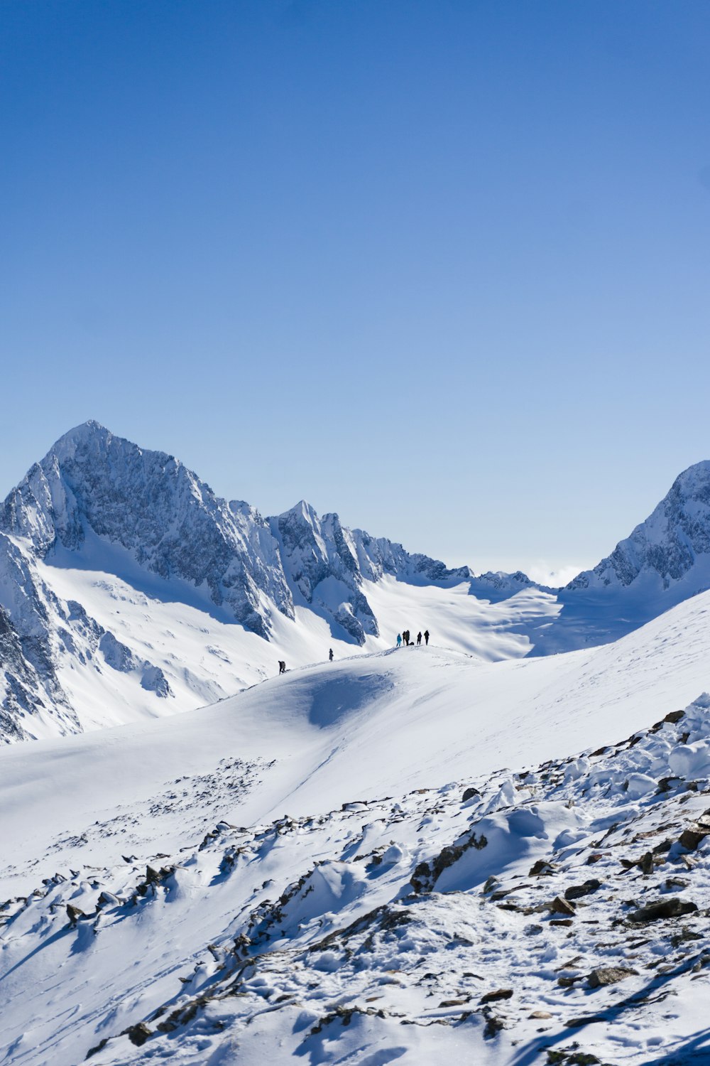 snow covered mountain under blue sky during daytime