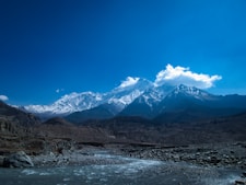 snow covered mountain under blue sky during daytime