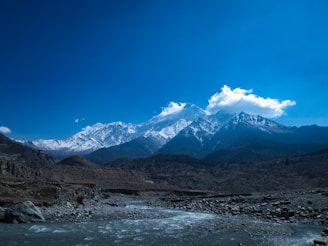 snow covered mountain under blue sky during daytime