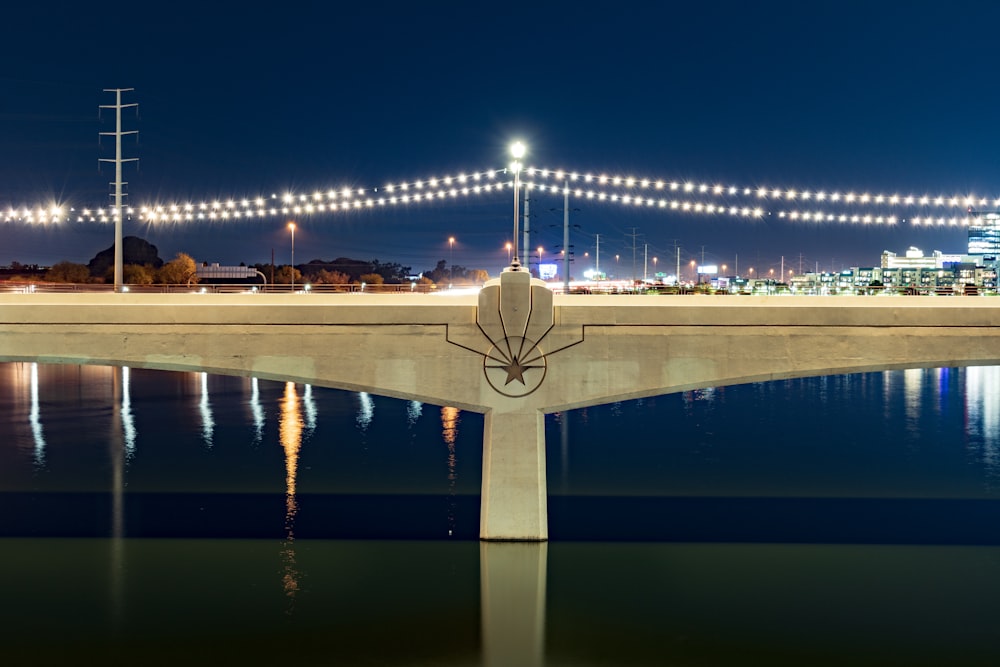 white lighted bridge during night time