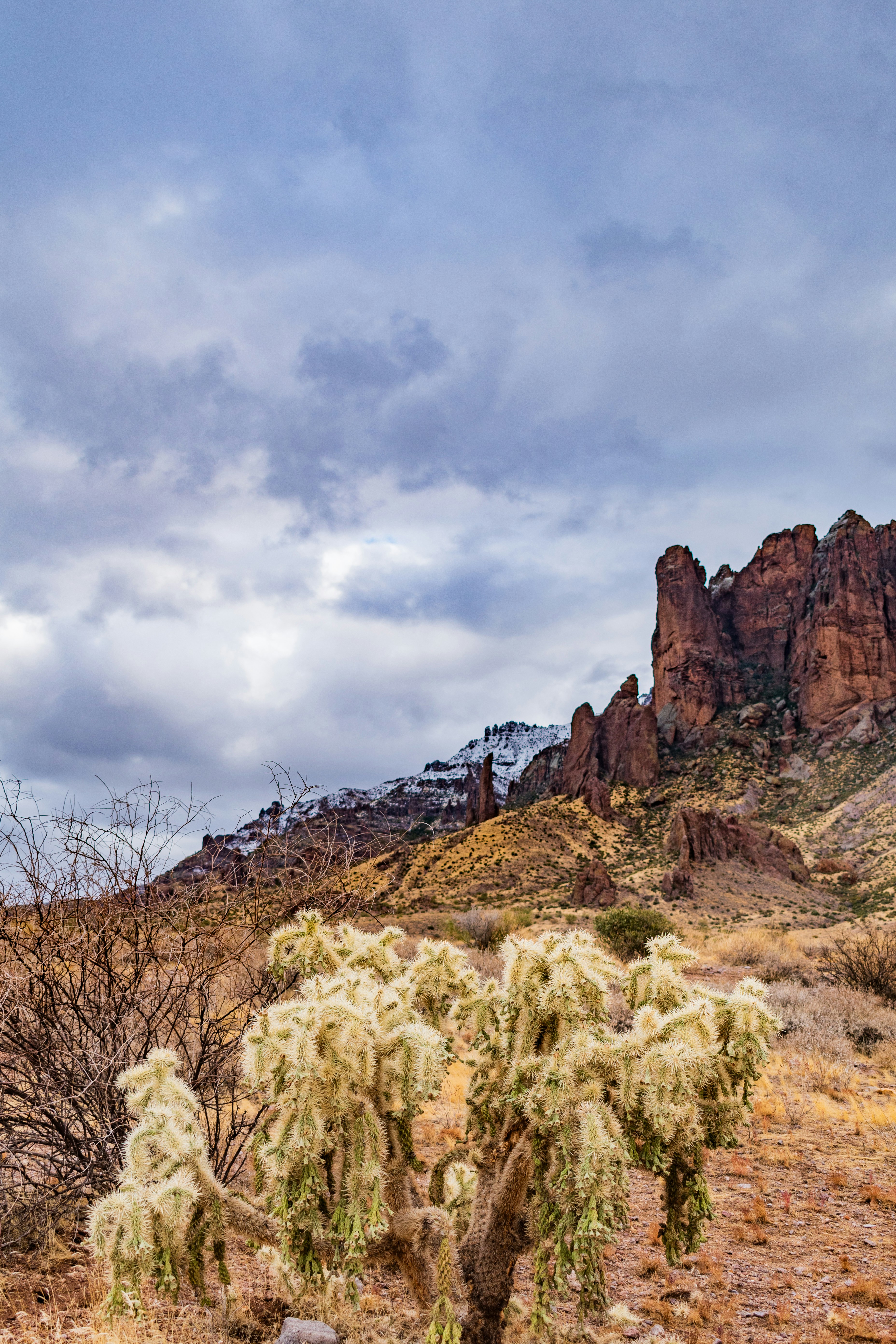 It's hard to believe the snow-capped Superstition Mountains, as well as an almost completely covered Four Peaks. This was a solo hike, not too far into the trail. The cold desert winter and cloud coverage made for a great scenic evening.