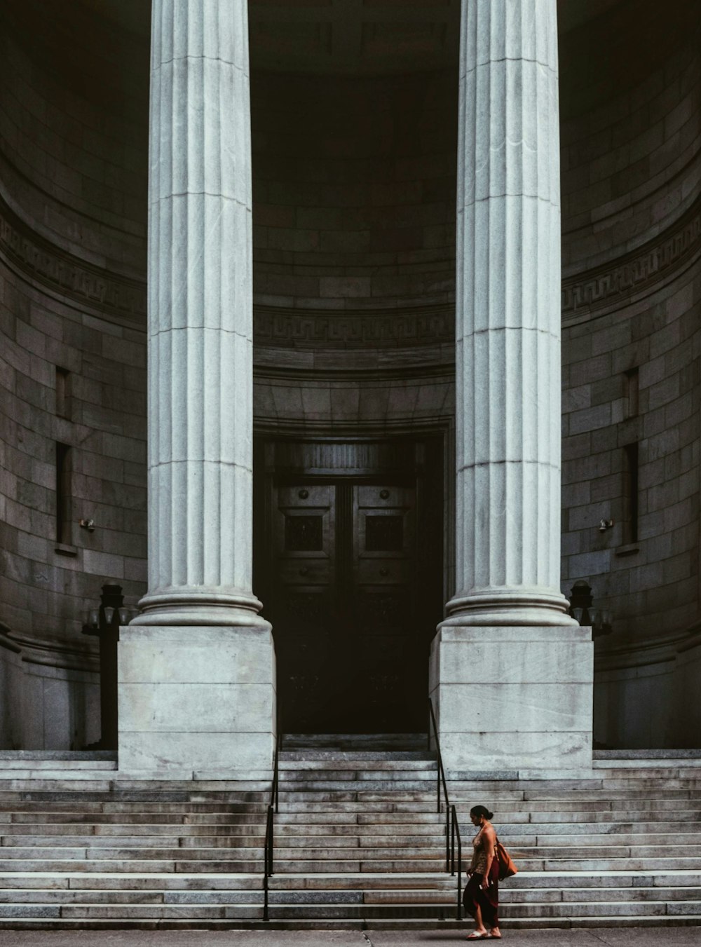 gray scale photo of concrete pillars