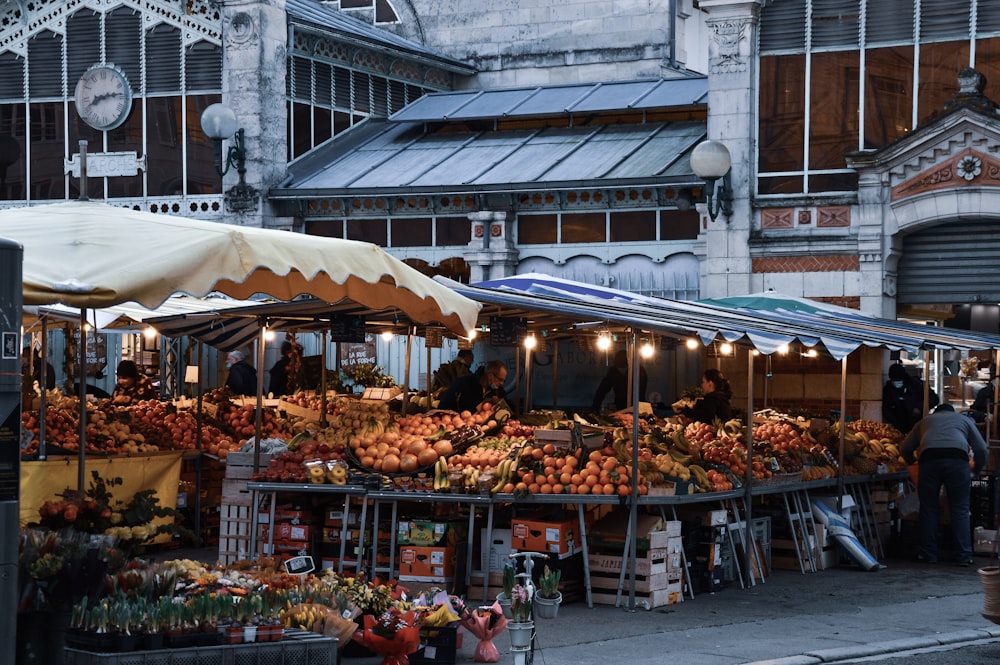 people walking on market during daytime