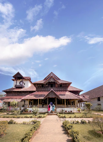 The welcoming entrance of Sthira Nivas, showcasing traditional architecture with vibrant colors.