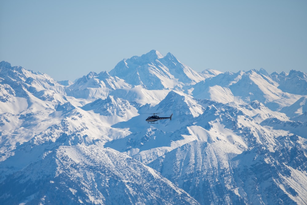 snow covered mountain during daytime