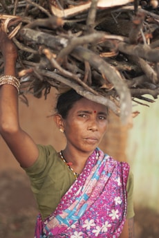 woman in green shirt wearing silver bracelet