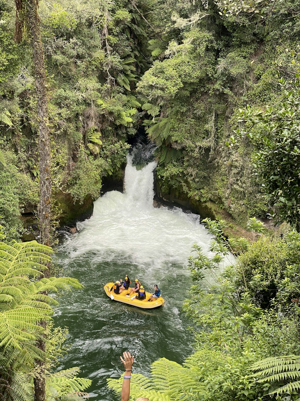 man in yellow kayak on river during daytime