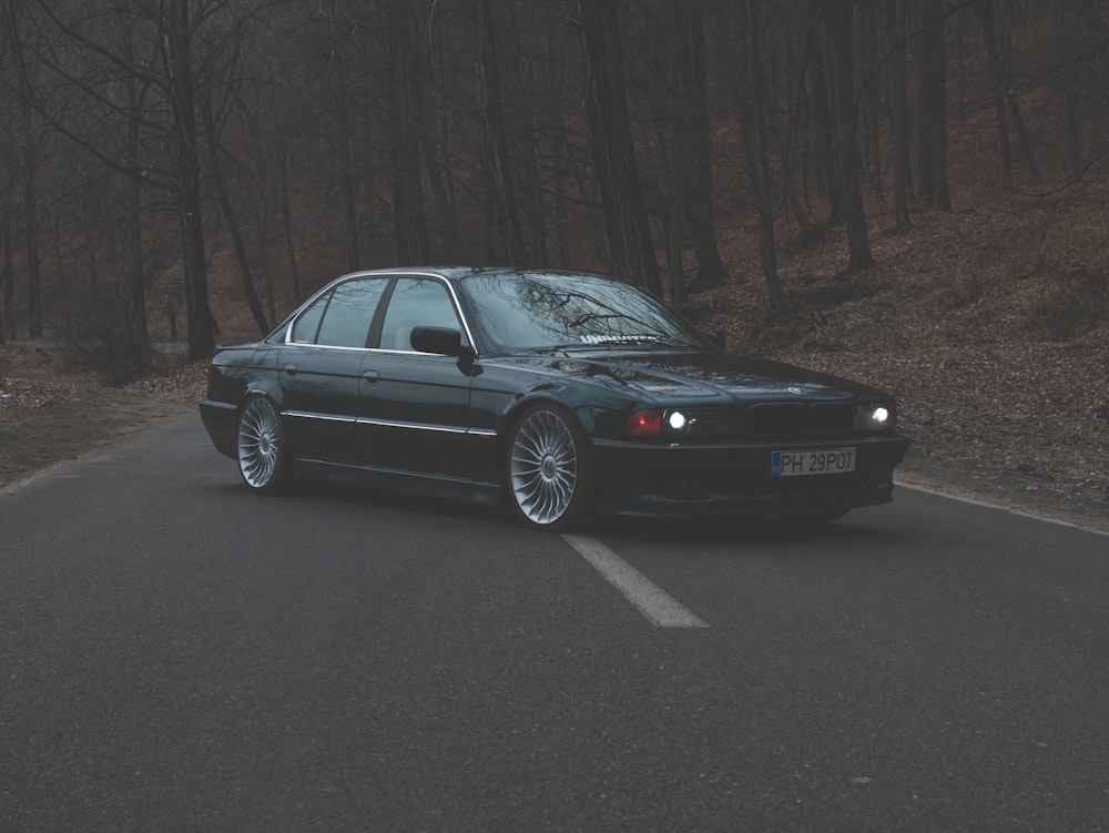 black bmw m 3 coupe on road