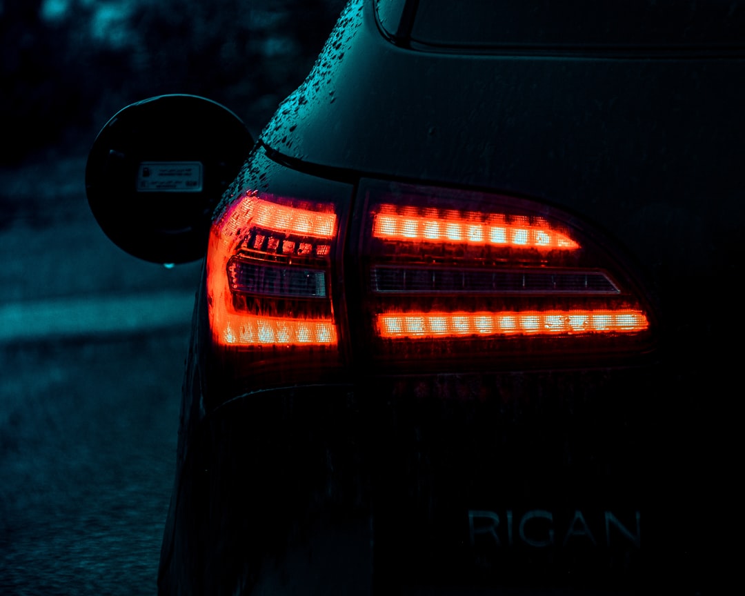 black car with red light,