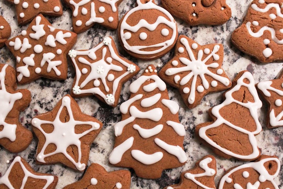 brown and white cookies with white star shaped candies,