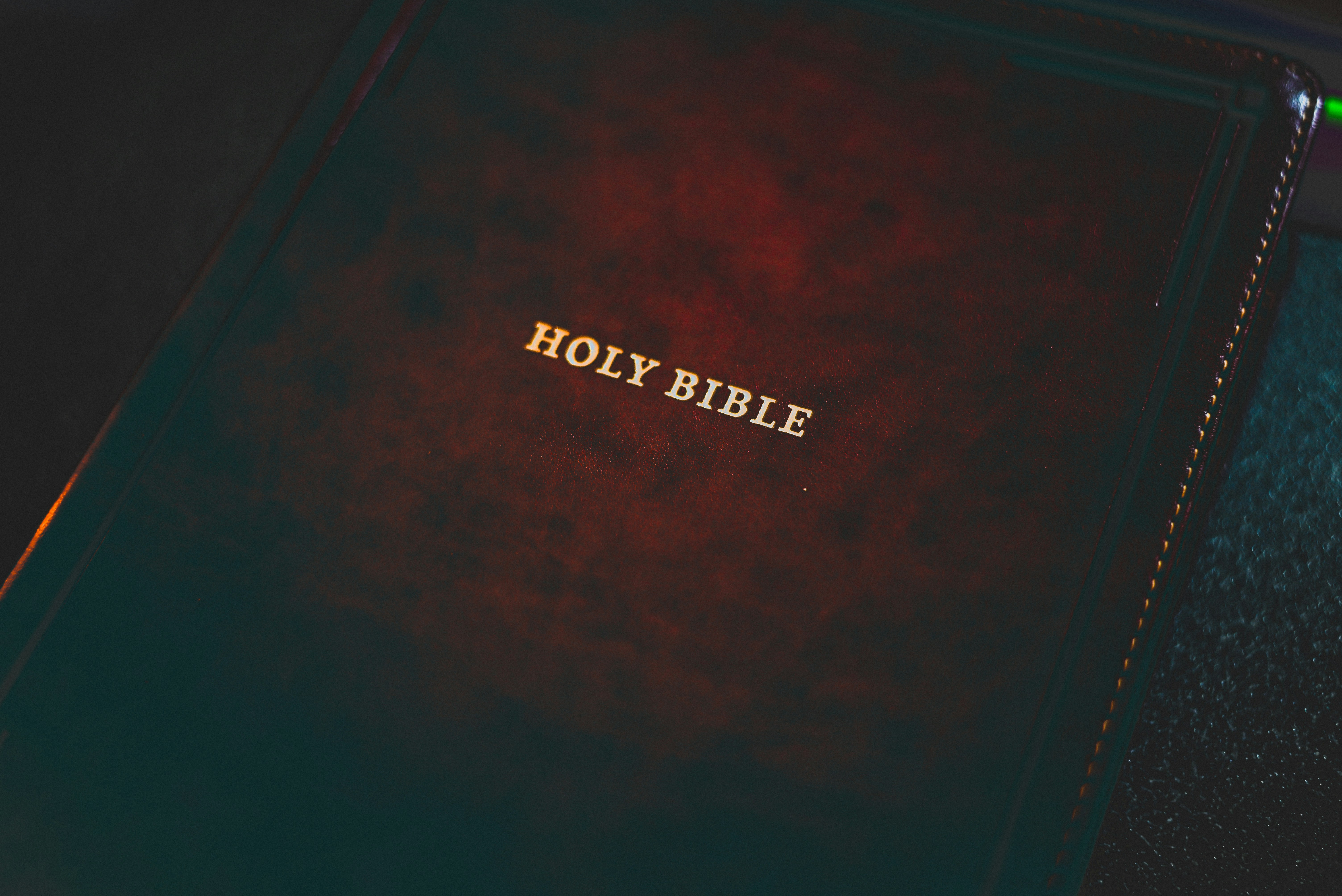 black samsung galaxy tab on blue textile