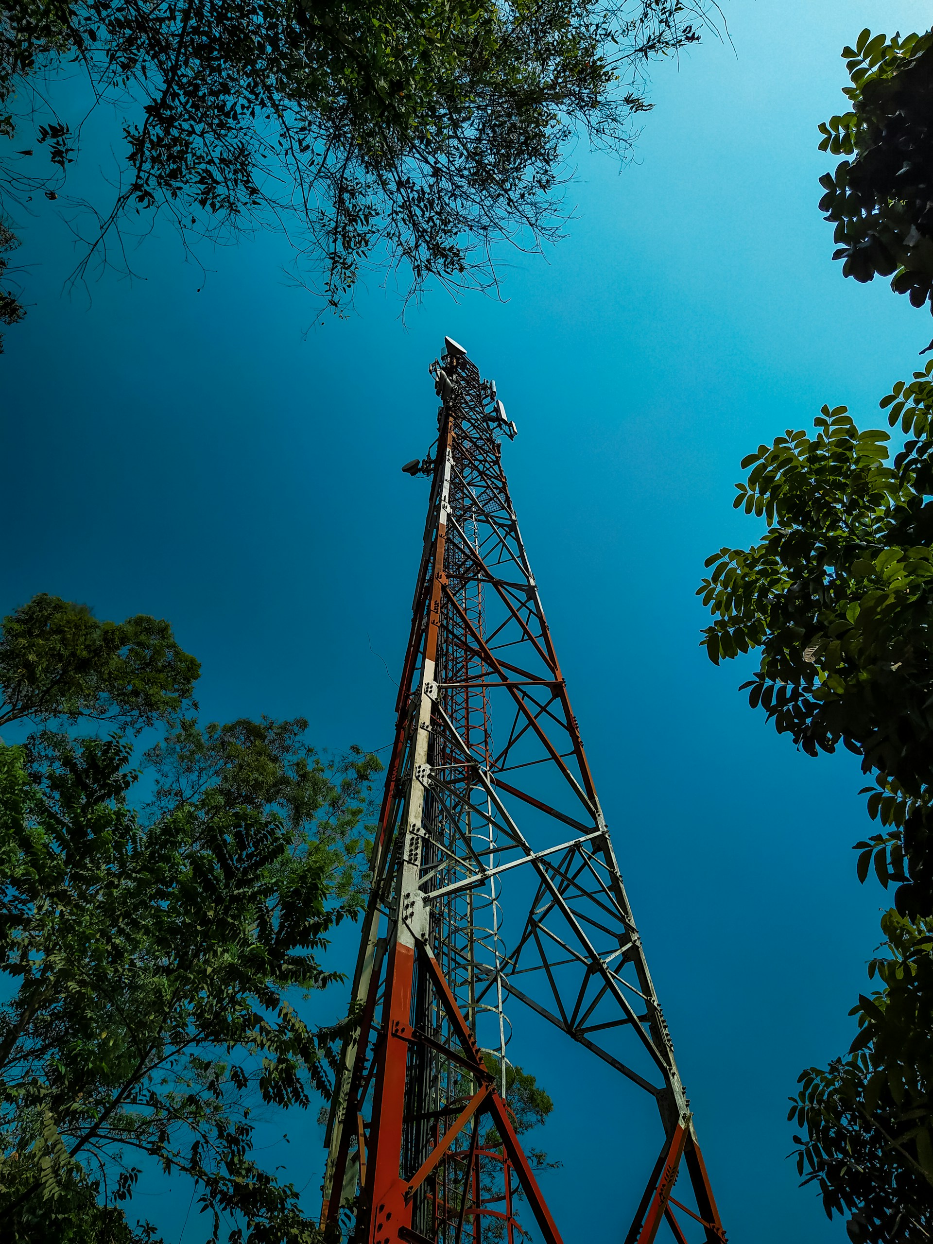 woman wearing yellow long-sleeved dress under white clouds and blue sky during daytime