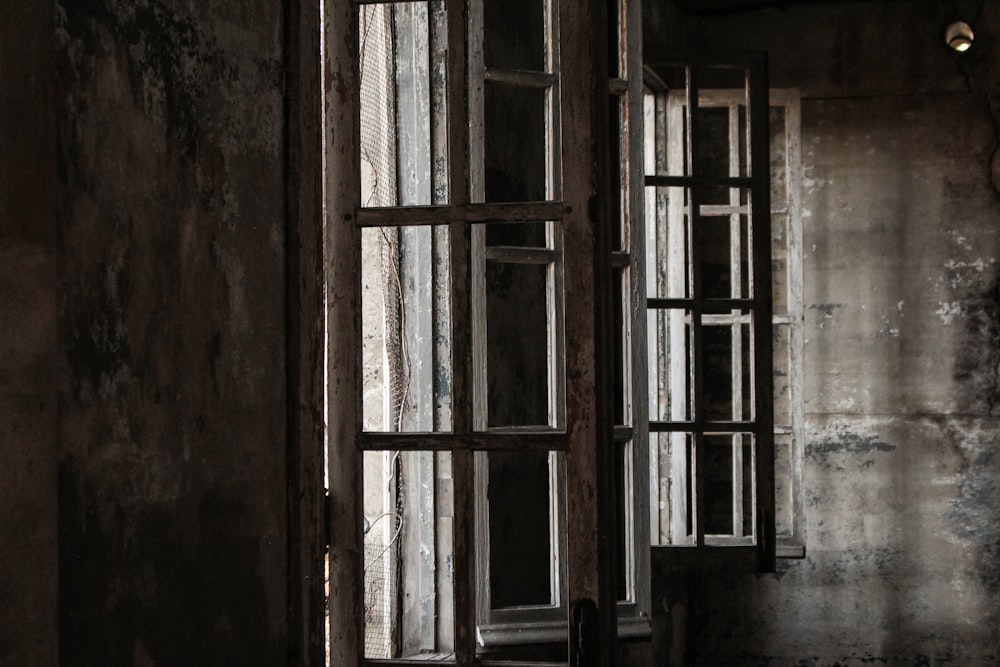 brown wooden framed glass window