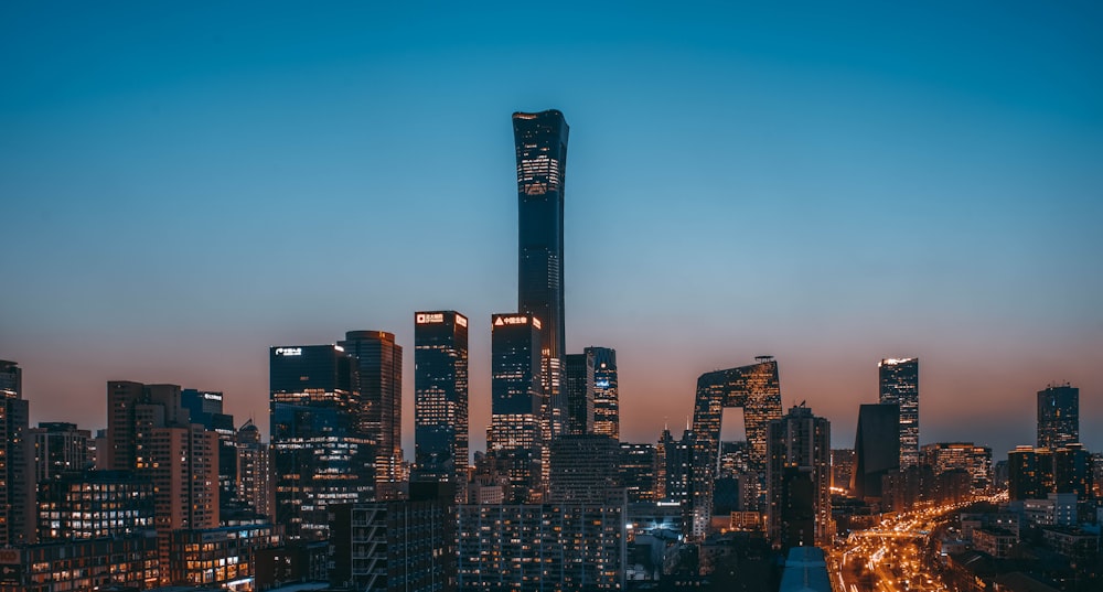 city skyline during night time