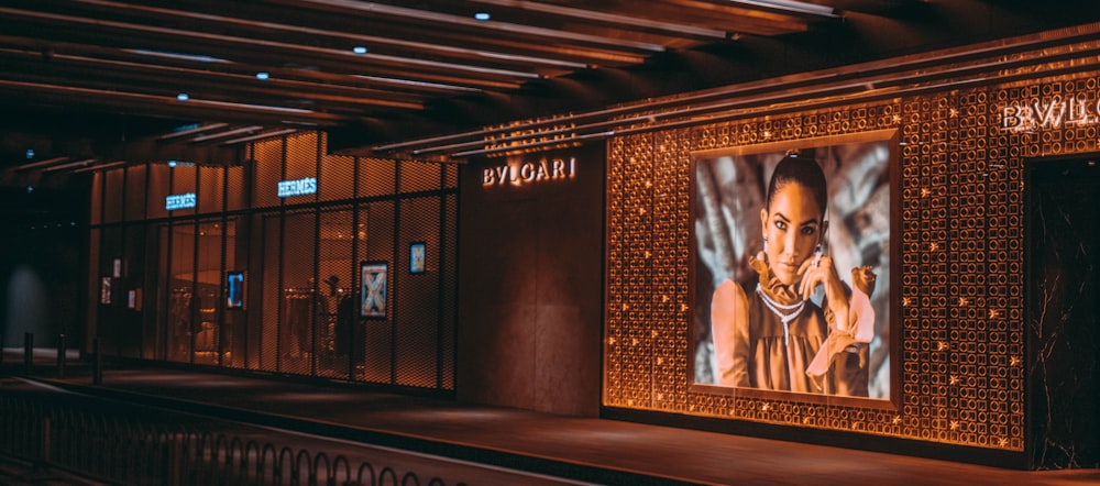 a photo of a woman on the wall of a building