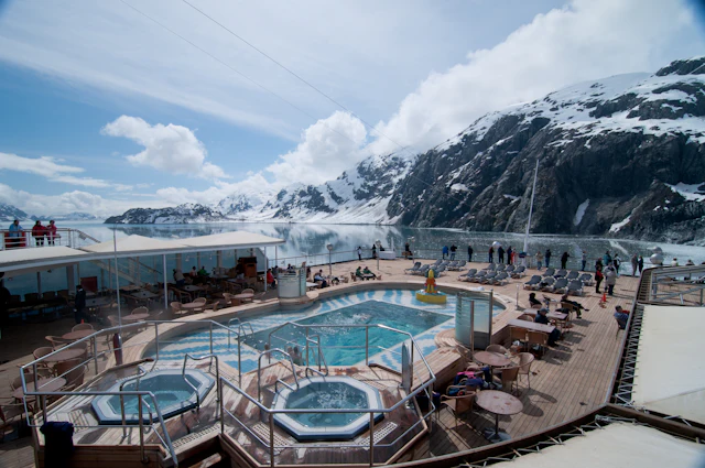 A cruise ship among the mountains of Glacier Bay, Alaska