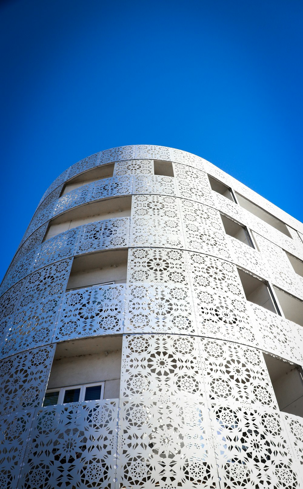 white concrete building under blue sky during daytime